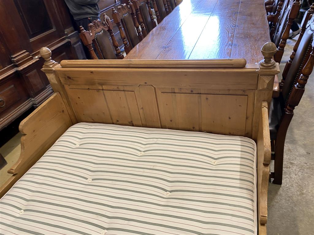 A 19th century Continental pine bed frame and mattress, width 130cm, length 190cm